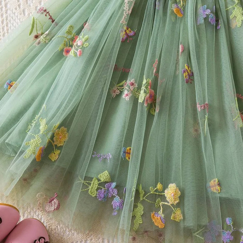 Dress covered in flower embroidery
