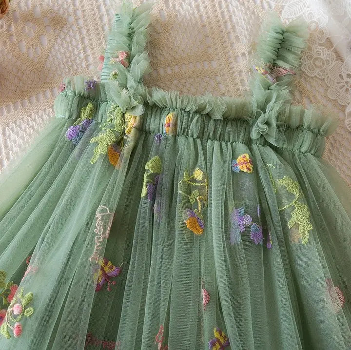 Dress covered in flower embroidery