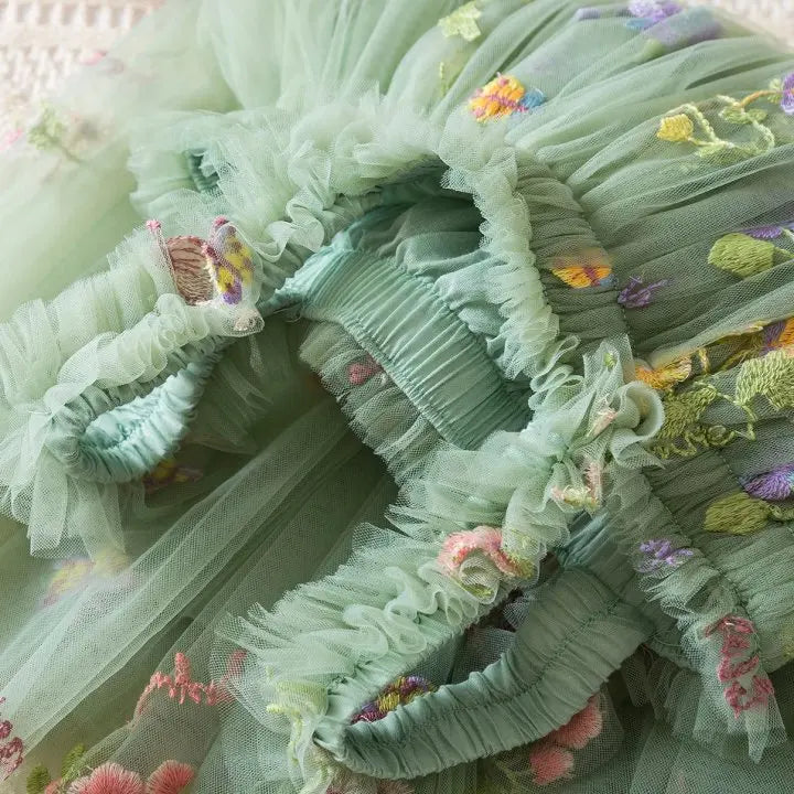 Dress covered in flower embroidery