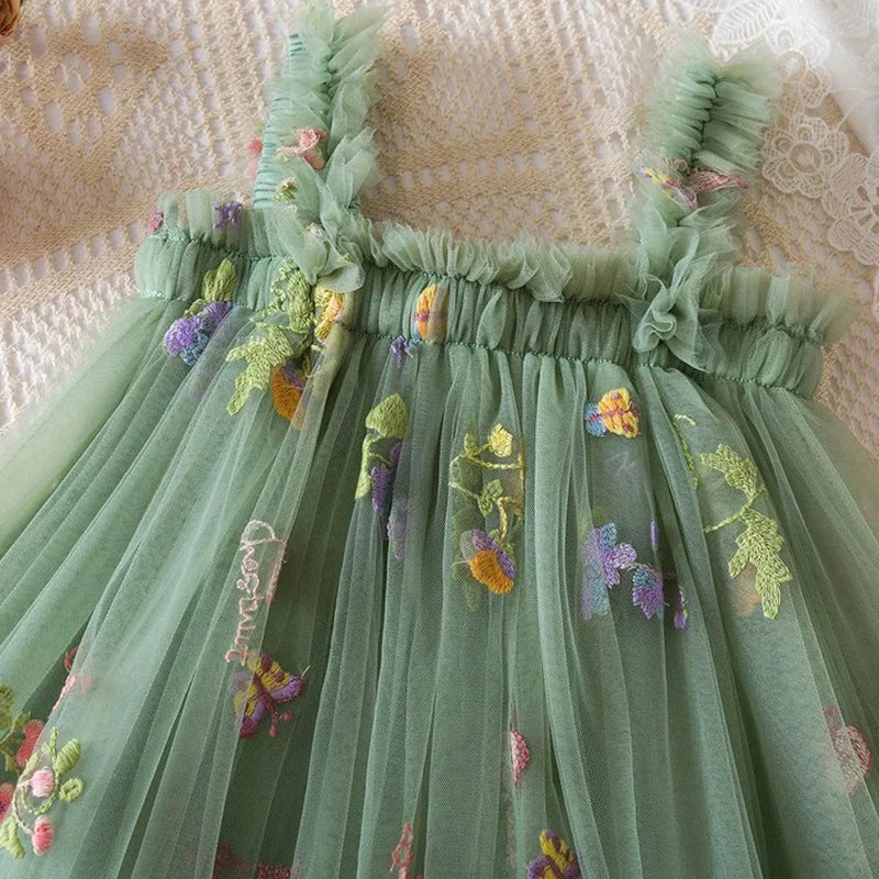 Dress covered in flower embroidery