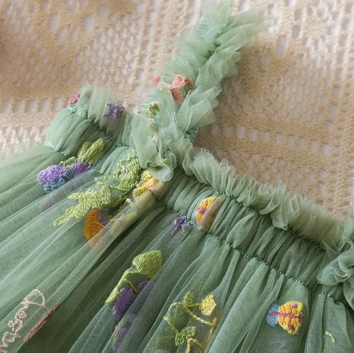 Dress covered in flower embroidery