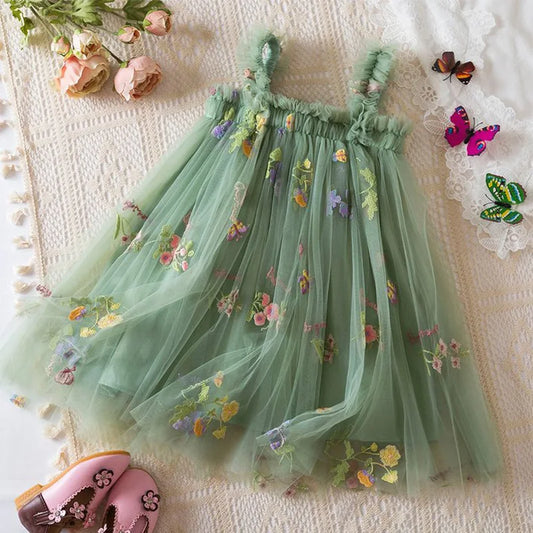 Dress covered in flower embroidery