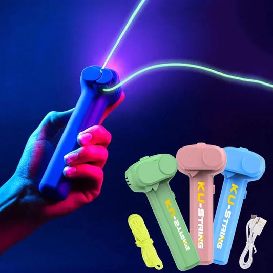 Glowing blue laser pointer held by a hand with colorful laser pointers and strings on a dark background.