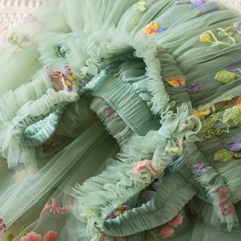 Dress covered in flower embroidery